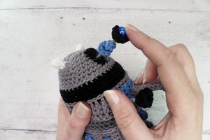 A crochet darlek being put together